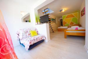 Postel nebo postele na pokoji v ubytování Apartments Claudia
