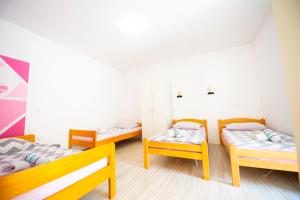 Postel nebo postele na pokoji v ubytování Apartments Claudia