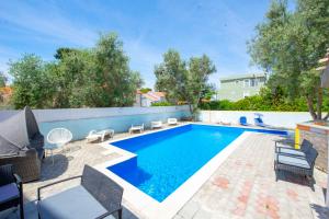 Bazén v ubytování Apartments Claudia nebo v jeho okolí