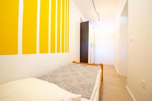 Postel nebo postele na pokoji v ubytování Apartments Claudia
