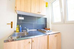 Kuchyň nebo kuchyňský kout v ubytování Apartments Claudia + 37 fotografií