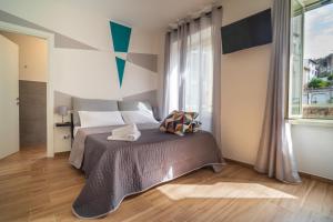 Postel nebo postele na pokoji v ubytování La Terrazza Anagni
