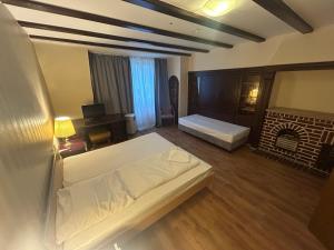 Ένα ή περισσότερα κρεβάτια σε δωμάτιο στο WestEnd#402 +1 φωτογραφίες