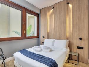 Postel nebo postele na pokoji v ubytování B&B Hotel Milano City Center Duomo