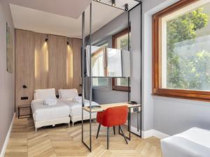 Postel nebo postele na pokoji v ubytování B&B Hotel Milano City Center Duomo
