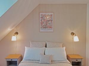 Postel nebo postele na pokoji v ubytování Charmant gîte cosy en Normandie