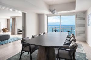 a dining room with a table and a view of the ocean at The Westin Maui Resort & Spa, Ka'anapali in Lahaina