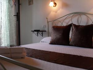 Tempat tidur dalam kamar di Il Vigneto B&B