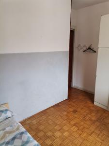 Postel nebo postele na pokoji v ubytování Camera in appartamento