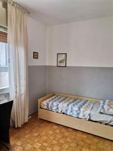 Postel nebo postele na pokoji v ubytování Camera in appartamento + 37 fotografií