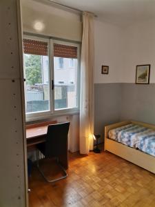 Postel nebo postele na pokoji v ubytování Camera in appartamento