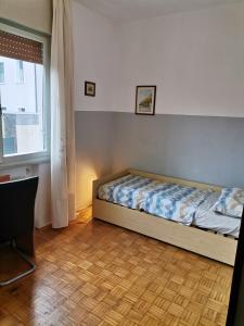 Postel nebo postele na pokoji v ubytování Camera in appartamento