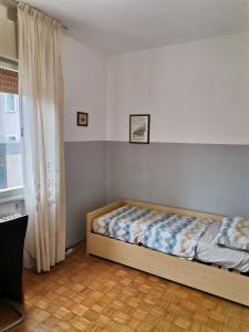 Postel nebo postele na pokoji v ubytování Camera in appartamento