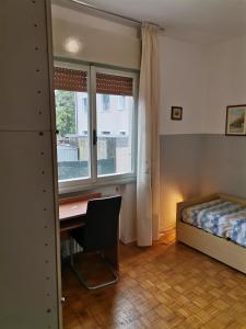 Postel nebo postele na pokoji v ubytování Camera in appartamento