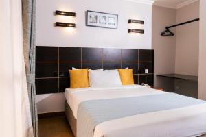 Postel nebo postele na pokoji v ubytování Eseriani The Hotel