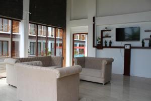 TV a/nebo společenská místnost v ubytování Hotel Havelock Gateway