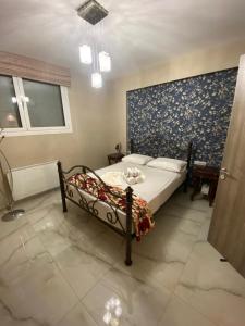 Katil atau katil-katil dalam bilik di Maison vue sur le mer