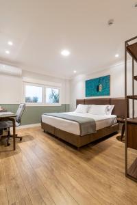 Postel nebo postele na pokoji v ubytování Hotel Kindermann Chapecó - Hotel Novo