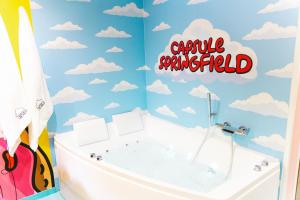 Koupelna v ubytování Capsule Springfield - Balnéo -Sauna - Billard