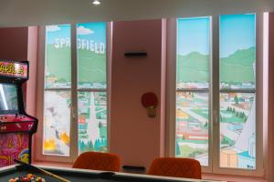 Herní místnost v ubytování Capsule Springfield - Balnéo -Sauna - Billard