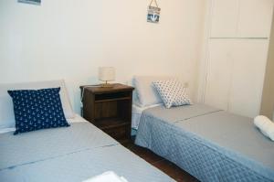 Postel nebo postele na pokoji v ubytování Casa Flaminia