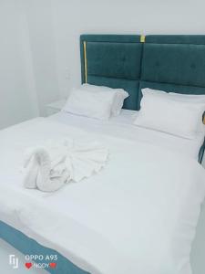 Postel nebo postele na pokoji v ubytování ANTIKA HOTEL / انتيكا للشقق الفندقيه