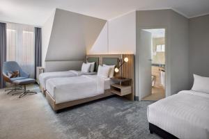 Postel nebo postele na pokoji v ubytování Courtyard by Marriott Schwerin