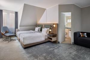 Postel nebo postele na pokoji v ubytování Courtyard by Marriott Schwerin