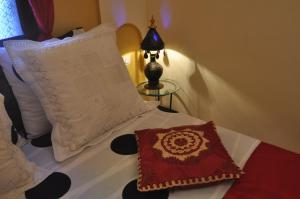 Cama o camas de una habitación en Riad La Famille