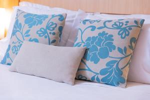 En eller flere senge i et værelse på Hotel Lieto