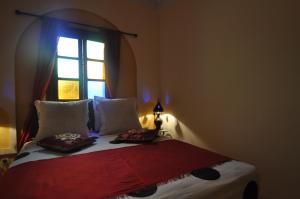 Cama o camas de una habitación en Riad La Famille