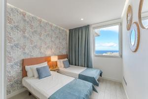 Postel nebo postele na pokoji v ubytování Ocean Garden Playa Paraiso + 37 fotografií