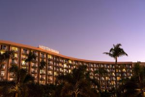 a large building with palm trees in front of it at The Westin Maui Resort & Spa, Ka'anapali in Lahaina