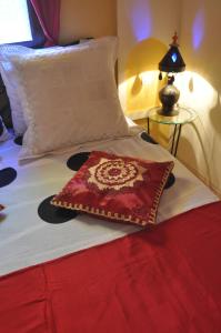 Cama o camas de una habitación en Riad La Famille
