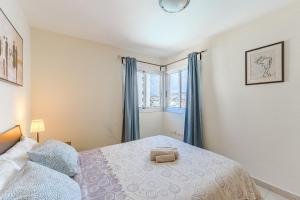 Postel nebo postele na pokoji v ubytování Sol Playa Paraiso + 37 fotografií