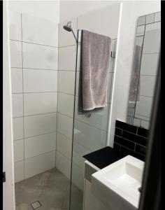 Bathroom sa Palm Hamilton Backpacker