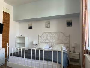 Łóżko lub łóżka w pokoju w obiekcie Narutowicza 5 Apartments