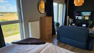 Telewizja i/lub zestaw kina domowego w obiekcie Apartament Buk