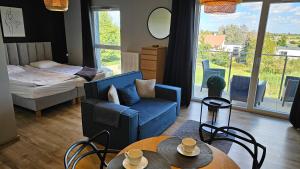 Łóżko lub łóżka w pokoju w obiekcie Apartament Buk