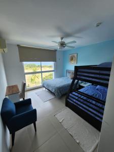 Postel nebo postele na pokoji v ubytování PlayaBlanca Ocean Blue "Vista al Mar" + 37 fotografií