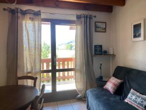 Zona d'estar a Logement Belle vue, Reposant