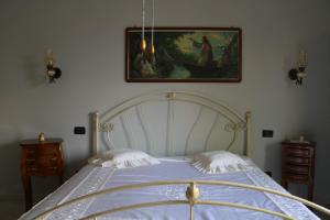 Postel nebo postele na pokoji v ubytování Albachiara B&B