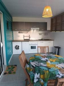 Kuchyň nebo kuchyňský kout v ubytování Tukusi Bungalow + 5 fotografií