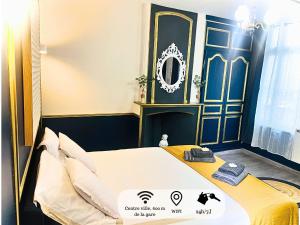 Postel nebo postele na pokoji v ubytování Studio Royal Saint-Omer Centre