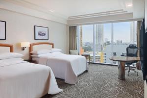 TV a/nebo společenská místnost v ubytování Sheraton Manila Bay