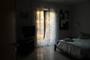 Letto o letti in una camera di Albachiara B&B