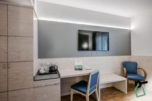 Köök või kööginurk majutusasutuses HOTIDAY Room Collection - Torbole