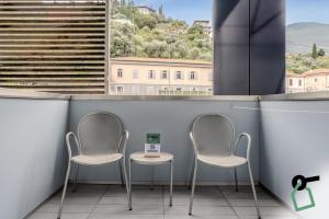 Foto sihtkohas Nago-Torbole asuva majutusasutuse HOTIDAY Room Collection - Torbole galeriist