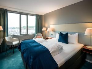 Postel nebo postele na pokoji v ubytování Quality Hotel Tønsberg