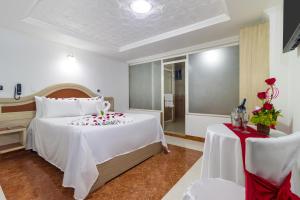 Postelja oz. postelje v sobi nastanitve Hotel Zulita